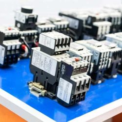 Mechanically held relays and contactors are often used because